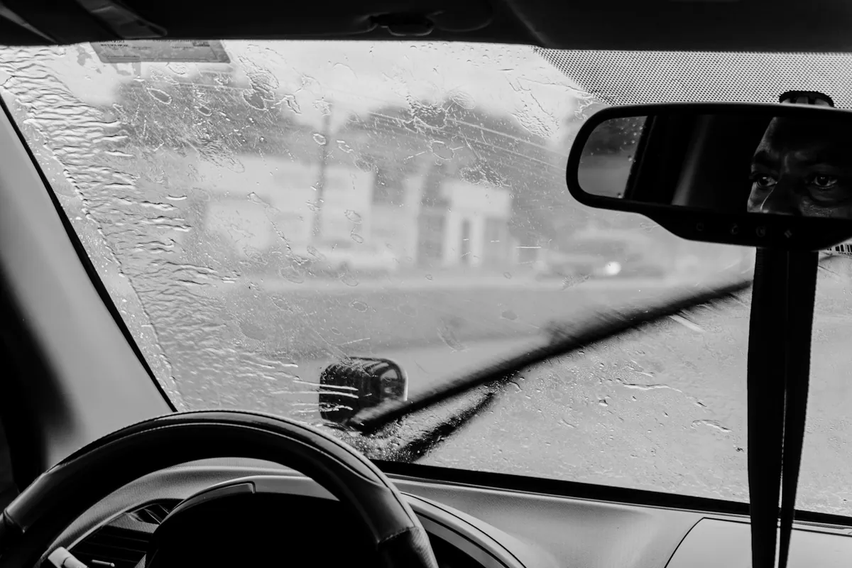 Iced-over windshield seen from the driver seat on a winter morning near Bowie